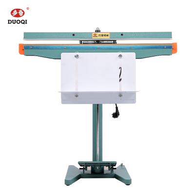 China With Ribbon Color Coding DUOQI PFS-650*1 Food Industry Aluminum Frame Foot Pedal Sealing Machine for sale