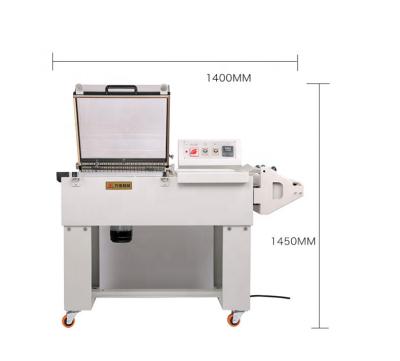 China Food DUOQI FM5540 2 in 1 wholesale shrinksealer hand packing SEAL GASKET MACHINE for pet bottle carton box books for dress for sale