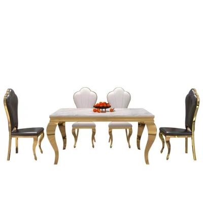 China European luxury high quality convertible and elegant fashion popular black artificial marble dining room dining table and chairs for sale