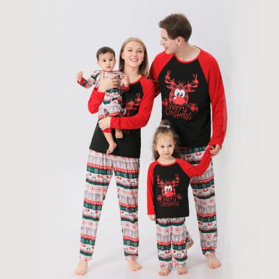 China Fashion Family Christmas Pajamas Thermal Cartoon Printed Logo Custom Sleepwear for sale