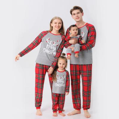 China Thermal High Sales Cartoon Printed Sleepwear Christmas Pajamas Family Parent-child Matching Suit for sale