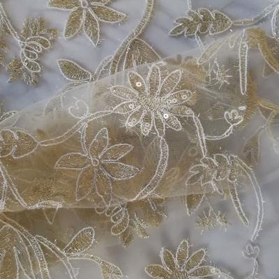 China Viable Wedding Shantou Bridal Tulle Beaded Shiny Party T/T Knitted White Gold Lace Fabric Fabric Chemical Embroidery Veil Lace Fabric for sale