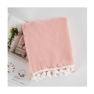 China Boy/Girl Blanket Moq Muslin Cotton Anti-Static Baby Down Wrap Blankets With Pompoms Toddler Infant Baby for sale