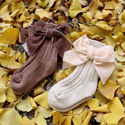 China QUICK DRY Wool Baby Bowknot Autumn Winter New Style Big Socks Kids Ins. Tall Medium Stockings for sale