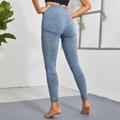 China Women Workout Wear Solid Color Breathable Seamless Panties Running Seamless Gaiters Sticky Yoga Pants For Gym for sale