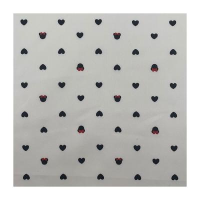 China Low Price Woven Light Weight 100% Combed Cotton Sateen Moisture-absorbent Heart Printed Fabric For Garment for sale