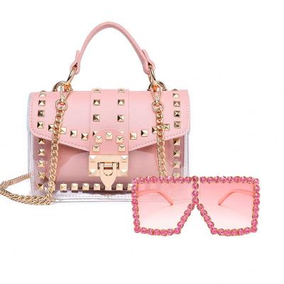 China 2021 Fashion Best-selling Summer Rivet Designer Bag With Sun Glasses Fashion Bag One Key PVC Jelly Purse Women Handbags Transparent for sale