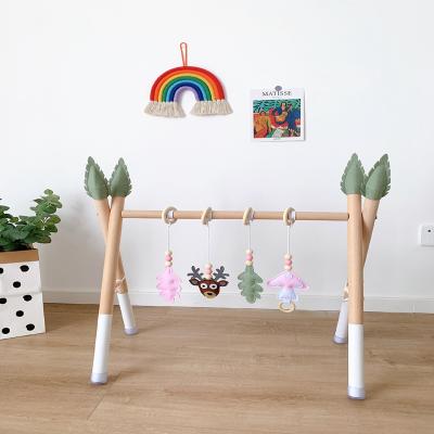 China Organic wooden wooden play gym baby set for infants with hanging ornaments. for sale