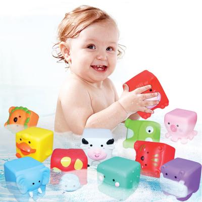 China 3D Silicone Touch Cube Emboss Hand Ball Baby Bricks Teether Squeeze Food Grade Silicone Bath Toys for sale