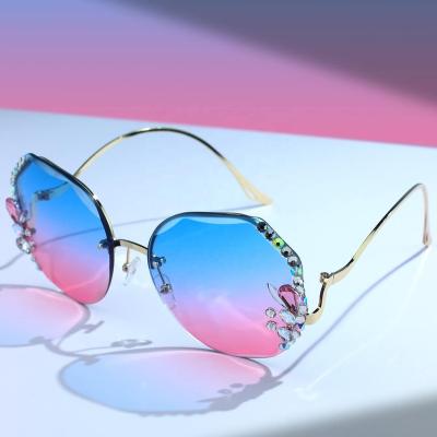 China New Arrival Rhinestone Decor Fashion Sunglasses Women 2022 Edge Diamond Crystal Rimless Sunglasses for sale