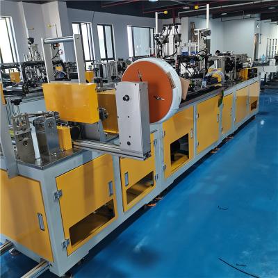 China Min mask machine kn95 mask sealing machine 120 pcs stainless steel automatic mask kn95 mask cutting machine for sale