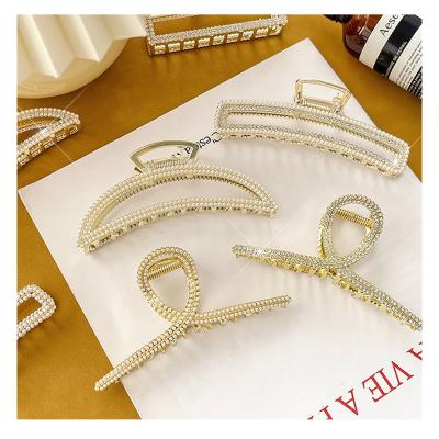 China Newest Women's Latest Women's Thick Rhinestone Alloy Metal Rhinestone Rectangle Pearl Gold Hair Claw Cross Cross Chunky Clip for sale