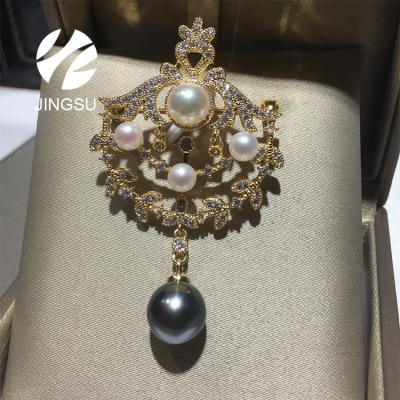 China Trendy akoya pearls and tahitian copper bead pin flower with silver plated brooch pin design for sale