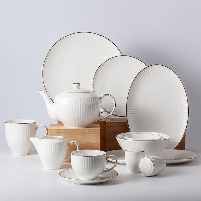 China TOP-END Sustainable Hotel Restaurant Gold Rim Embossed Western Style White Ceramic Porcelain Dinner Tableware Set for sale