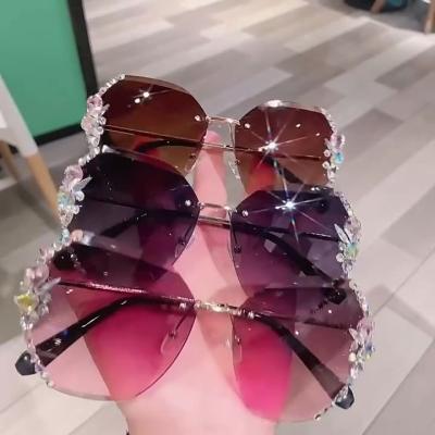 China Rimless Metal Diamond Shades Sunglasses Women Fashion New Luxury High Quality Cut Sunglasses 2022 Fashion for sale