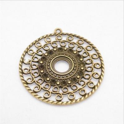 China Wholesale Vintage Round Flower Metal Vintage Pendant Charms For Necklace Making for sale