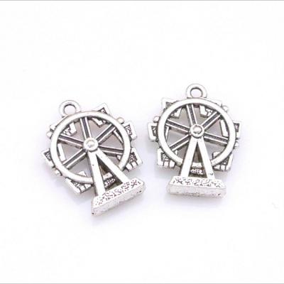 China BOHEMIA Tibetan silver color charms zinc alloy factory making mini ferris wheel toy charms for jewelry making for sale