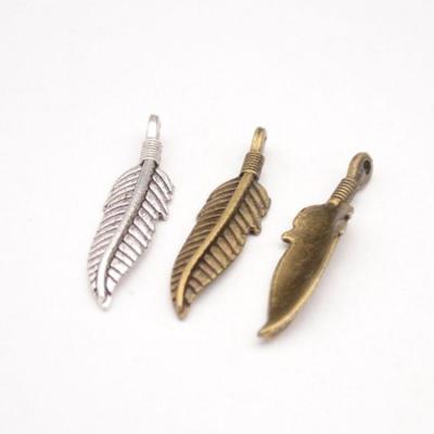 China Vintage Wholesale Zinc Alloy Antique Bronze Pendant Charms Small Feather Leaf Charms For Jewelry Making for sale