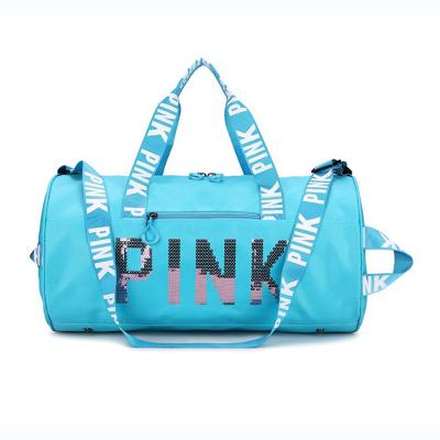 China Fashion Customized Logo Large Capacity Pink Duffle Bags Gym Women Waterproof Sports Travel Bag for sale