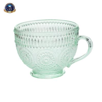 China Sustainable Breakfast Milk Cup Embossed Sunflower Pattern Glass Water Cup Large Capacity for sale