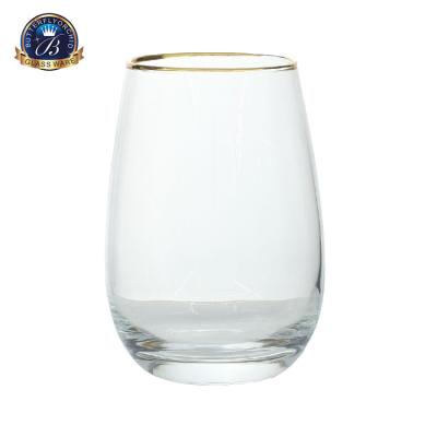 China Minimalist Handcrafted Egg Shape Drinking Tumbler Water Glass Cups Glassware With Gold Rim for sale