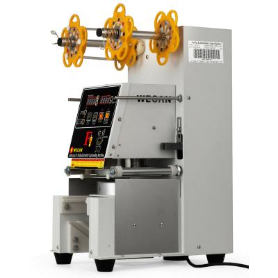 China Automatic Electric Beverage Cup Packing Machine Bubble Tea Cup Sealing Machine With Digital Sensor for sale