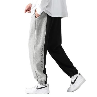 China Anti-Wrinkle Fashion Wholesale Streetwear Cotton Polyester Autumn Men Pants Casual Jogger Pants for sale