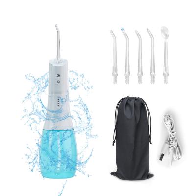 China IPX7 New Waterproof Handheld Dental Water Flosser with Multiple Nozzles and 5 Modes for sale