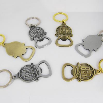 China Sustainable Keychains Custom Metal Holder Key Chain Bottle Opener With Engraving Logo for sale