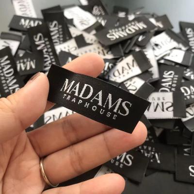 China Hot Selling Custom Recyled Main Label Woven Label On Black Background Woven Patches For Men's Black Background Woven Pattern Label for sale