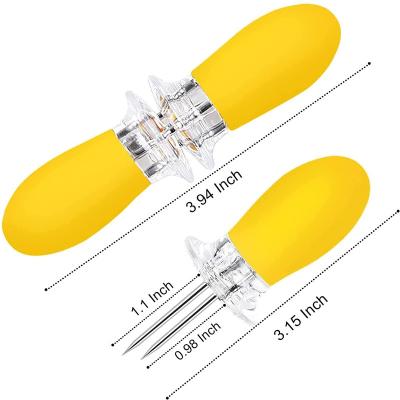 China Dustproof Stainless Steel Corn Cob Holders With Convenient Silicone Butter Handle Tool Stainless Steel Corn Grill Spread Fork for sale