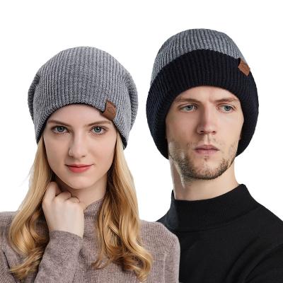 China COMMON Custom Contrasting Colors Reversible Plain Knit Beanie Hats For Winter Cuffed for sale