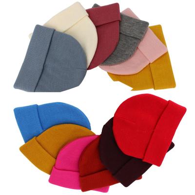 China COMMON Wholesale Winter Knit Plain Beanies Hat With Custom Unisex Logo for sale