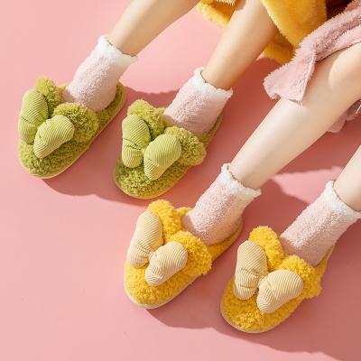 China CUSHIONING top selling soft plush cotton cute slippers shoes couple slippers women unisex indoor non-slip hairy home shoes for bedroom for sale