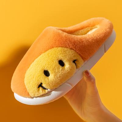 China SHOCK ABSORBING 2021 Blue Smiley Face Slippers Women Smile Slippers Happy Retro Smiley Face Soft Plush Warm Fuzzy Slippers For Men Wholesale for sale