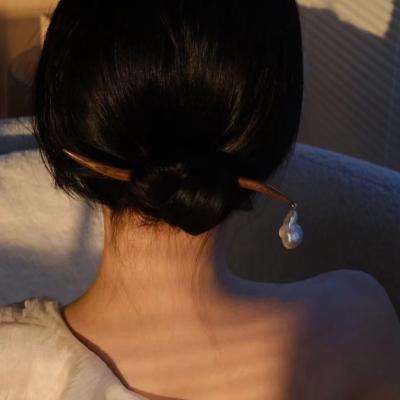 China Sandalwood Curve Big PEARL PEARL Classic Temperament Hairpin Women Hairpin Natural Baroque Pearl Hairpin for sale