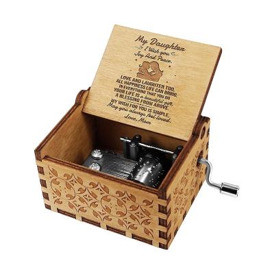 China Handmade Engraved Crank Operated Wooden Music Box For Gift for sale