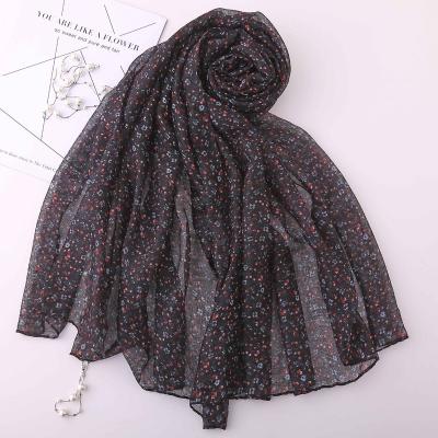 China Simple Flower Printing Female Thin Breathable Muslim Head Scarf And Neck New Autumn And Winter Gauze Bali Gauze Scarf Long for sale