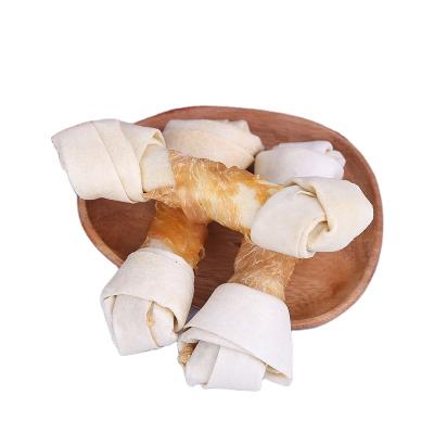 China Viable Cowhide Bone Wrapped Chicken Molar 6 Inches Dog Clean Snacks Teeth for sale