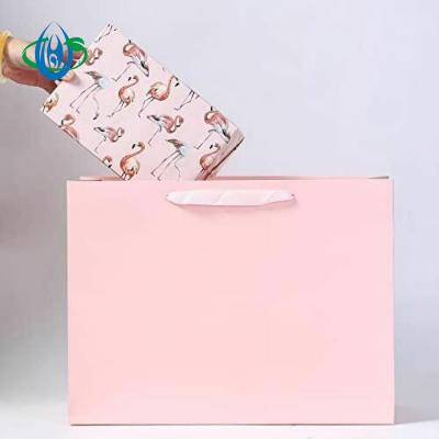 China Recyclable Christmas Party Kraft Paper Gift Bag Luxury Shopping Paper Bag With Handle For Gifts Tissues for sale