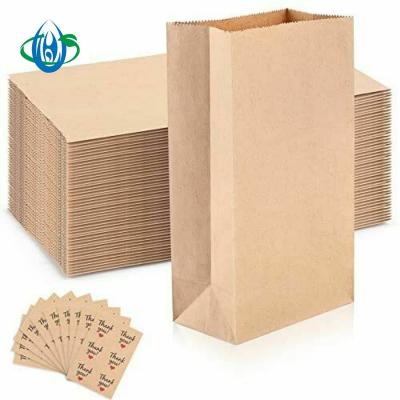 China Christmas Party SOS Kraft Paper Gift Bag Recyclable Shopping Paper Bag For Gift To Go Out Paper Bag for sale