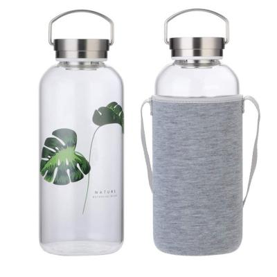 China Viable Heat Resistant Glass Water Bottle With Tea Infuser Tea Bottle 1.75 Liter Large Capacity Glass Bottle for sale