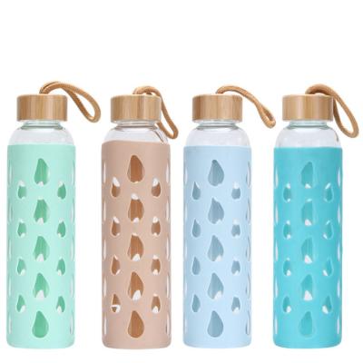 China Creative Sustainable Leakproof Portable Outdoor Silicone Sleeve Glass Water Bottle For Travel for sale