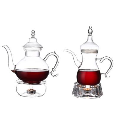 China Customized Contemporary Transparent Color Glass Teapot Sets 850ml Heat Resistant Glass Flower Pot for sale