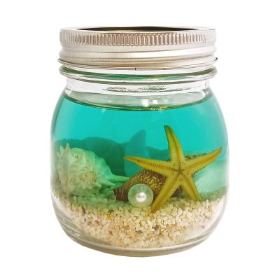 China Birthdays Glass Jelly Gel Scented LED Jar Candle Ocean Breeze Seashells Decoration Gel LED Light Scented Candle for sale