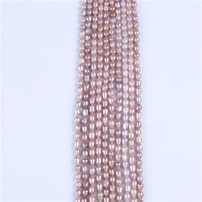 China Hot Sale Natural Freshwater Pearl Purple 5-6mm Rice Shape Pearl Strands For Cheap Price for sale