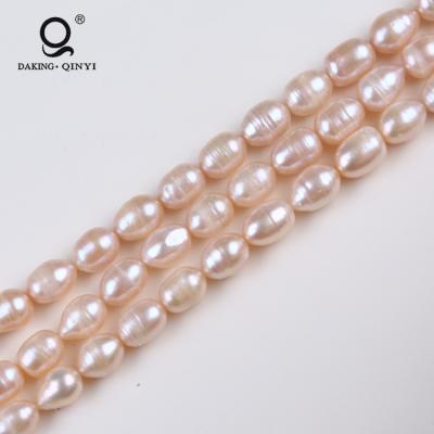 China Bracelet 10-11mm Natural Pink Big Size Bulk Rice Shape Loose Freshwater Pearl Beads String Price For Sale for sale