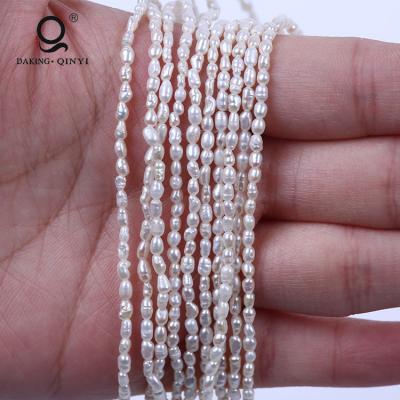 China Daking Freshwater Jewelry Pearl Rice 1-2mm Natural White Freshwater Pearl 16Inch B Grade Strand for sale