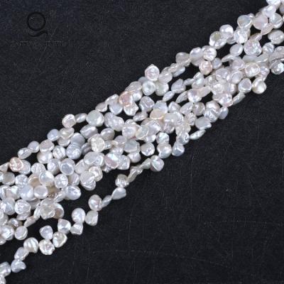 China Natural White Freshwater Pearl AA 7-8mm Irregular White Irregular Pearl Keshi Pearl Strands for sale