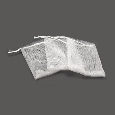 China Household Cheap Standard Quick Foam With String White Bathroom Soap Storage Bag Soap Saver for sale